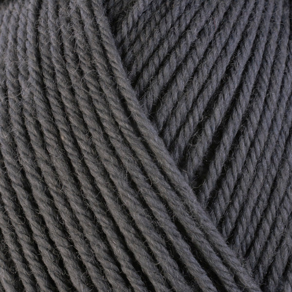 A close-up image of a skein of Berroco Ultra Wool worsted weight yarn in a heathered charcoal gray color.