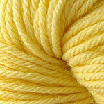 A close up of a skein of Berroco Vintage worsted weight yarn in creamy yellow color