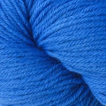 A close up of a skein of Berroco Vintage worsted weight yarn in vibrant blue color