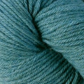 A close up of a skein of Berroco Vintage worsted weight yarn in deep aqua blue color