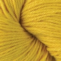 A close up of a skein of Berroco Vintage worsted weight yarn in vibrant yellow color