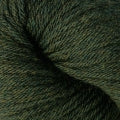 A close up of a skein of Berroco Vintage worsted weight yarn in deep muted forest green color