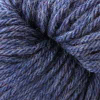 A close up of a skein of Berroco Vintage worsted weight yarn in muted blue color