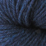 A close up of a skein of Berroco Vintage worsted weight yarn in deep dusty blue color