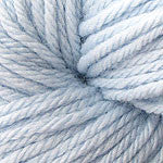 A close up of a skein of Berroco Vintage worsted weight yarn in light pale blue color