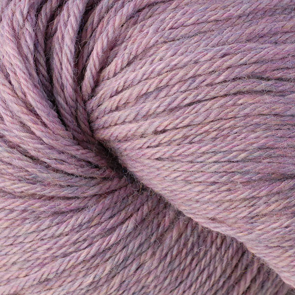 A close up of a skein of Berroco Vintage worsted weight yarn in pale mauve purple color