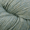 A close up of a skein of Berroco Vintage worsted weight yarn in earthy gray-green color