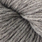A close up of a skein of Berroco Vintage worsted weight yarn in light grey color