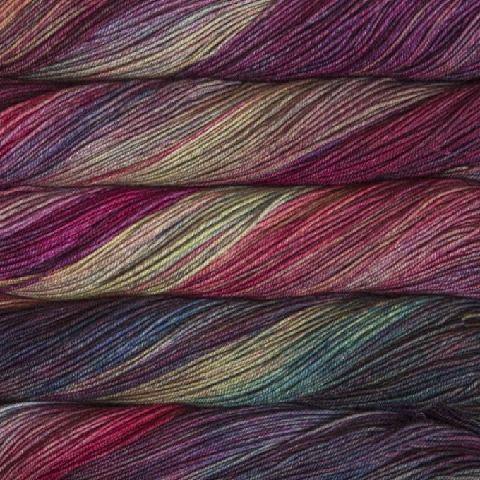 A close-up image of skeins of Malabrigo Sock yarn in a rainbow of colors.