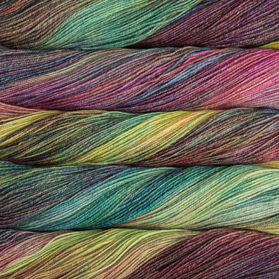A close-up image of skeins of Malabrigo Sock yarn in shades of blue, pink, and yellow green.