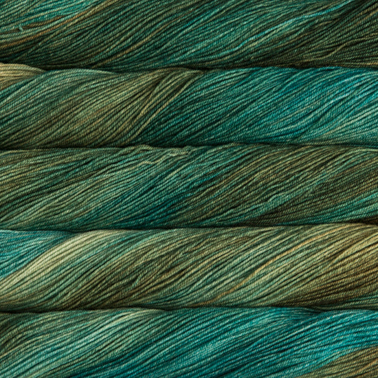 A close-up image of skeins of Malabrigo Sock yarn in shades of teal and green.
