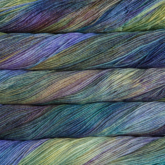 A close-up image of skeins of Malabrigo Sock yarn in shades of blue, green, and purple.