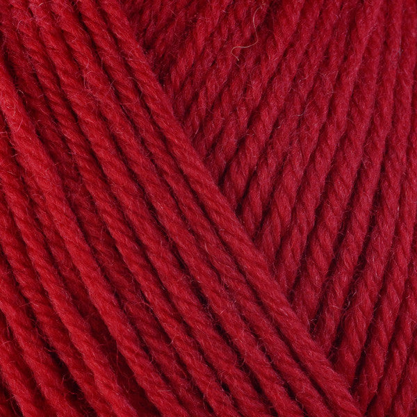 Close-up of orangish red yarn