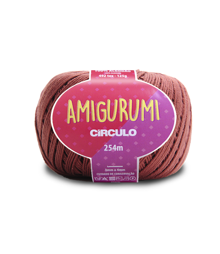 A skein of Amigurumi Circulo yarn in a medium brown color, featuring a pink and purple label with yellow text, set against a plain white background.