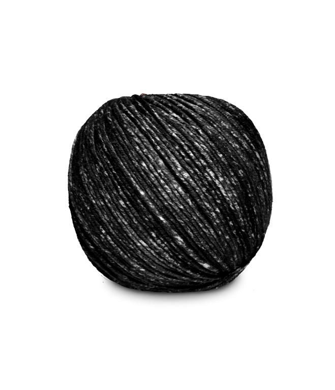 An image of a ball of Circulo Jeans DK weight yarn in the colors black and white against a white background.