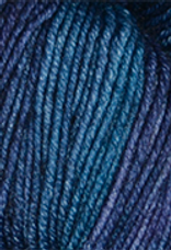 A close-up image of a skein of Circulo Lucky Feet sport weight yarn in shades of blue and indigo.