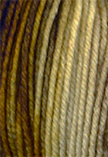 A close-up image of a skein of Circulo Lucky Feet sport weight yarn in pale yellow, golden yellow, and brown shades. 