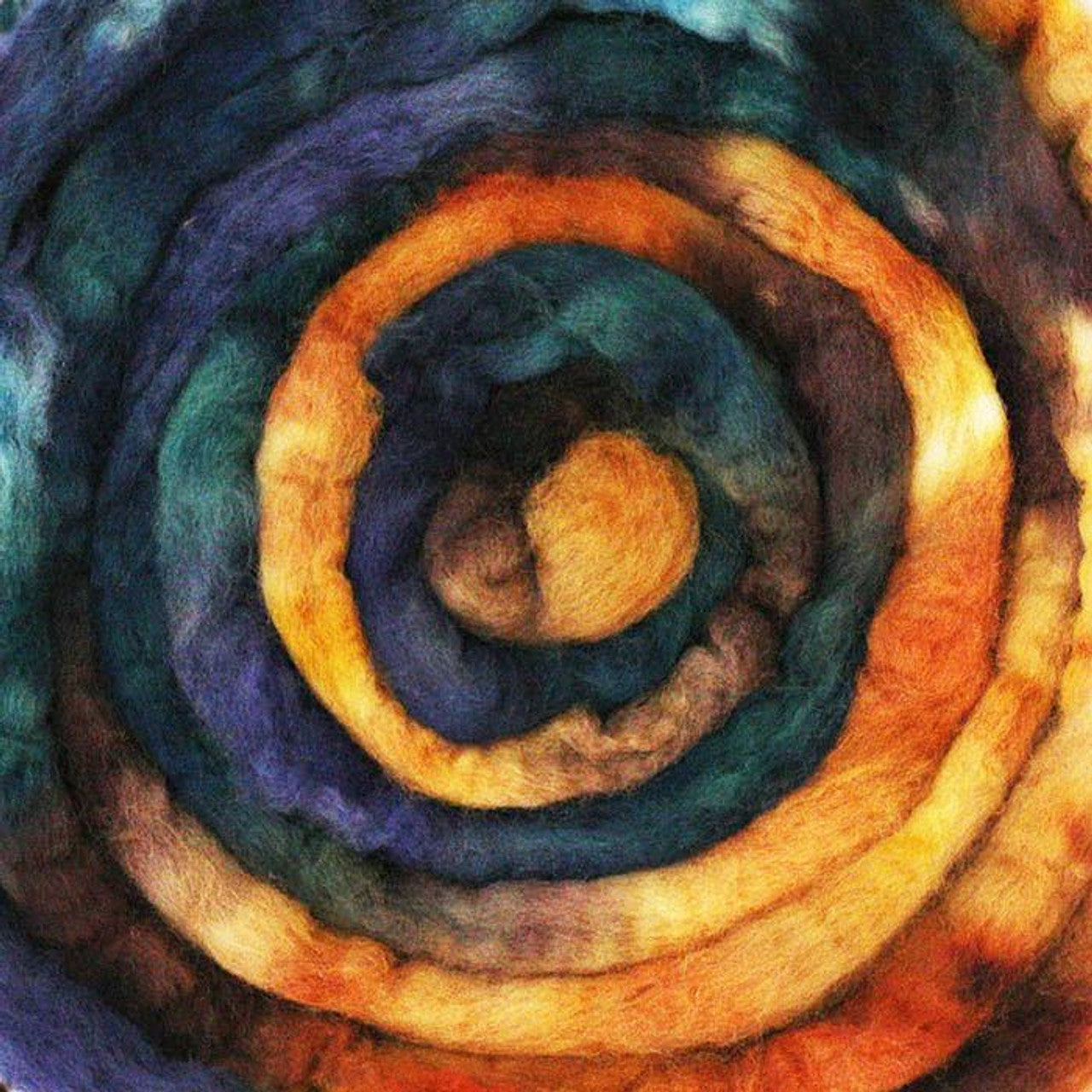 A close up of Frabjous Fibers BFL Spinning Fiber in orange, yellow, green, and blue colors