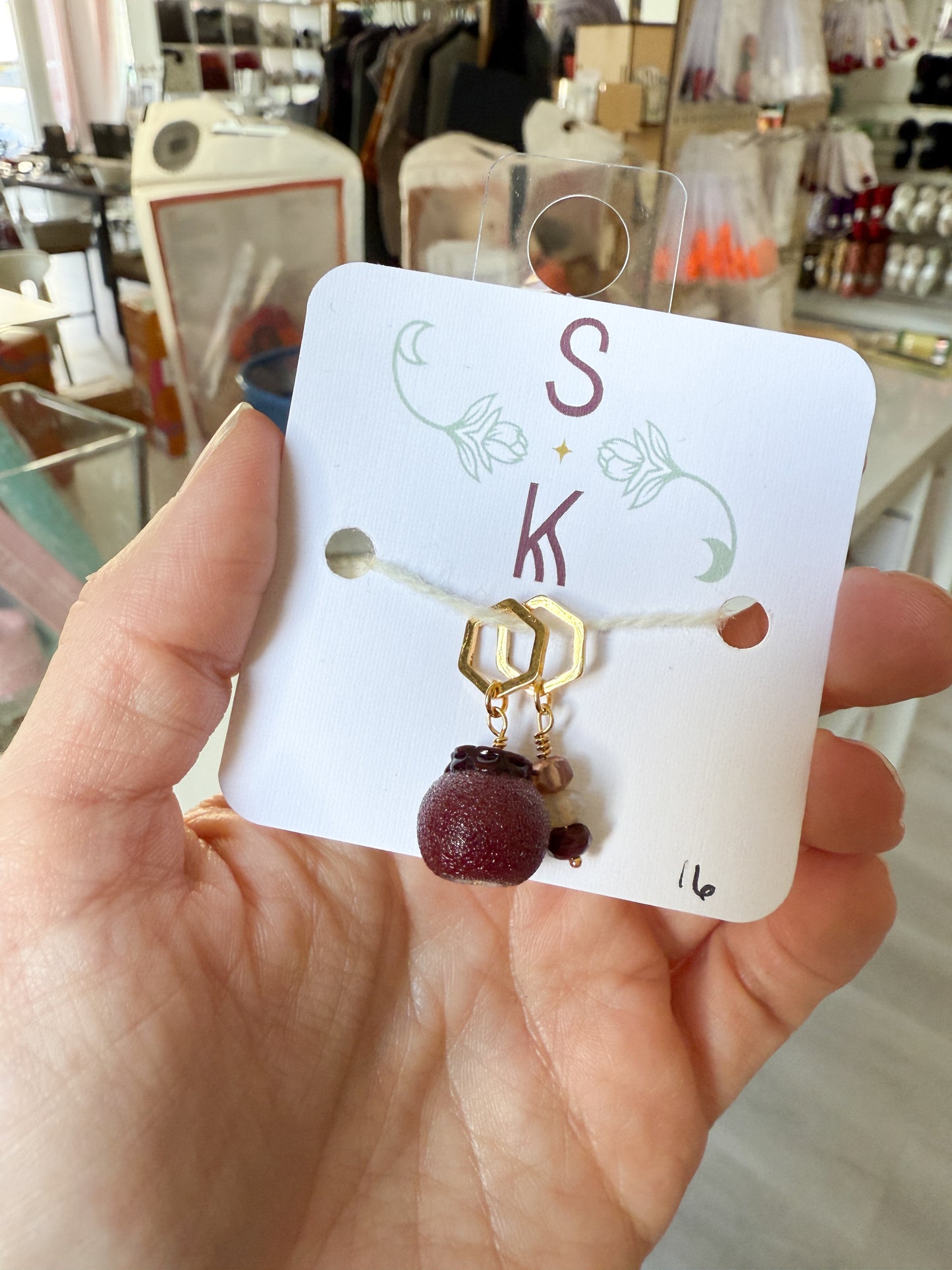 Persephone’s Pomegranate Stitch Markers by Sassafras Knits