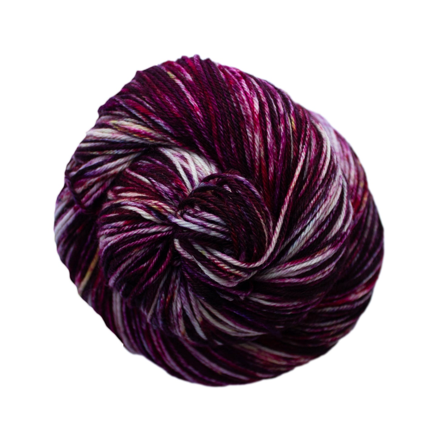 An image of a skein of Malabrigo Arroyo sport weight yarn in off-white and magenta shades with speckles of yellow.