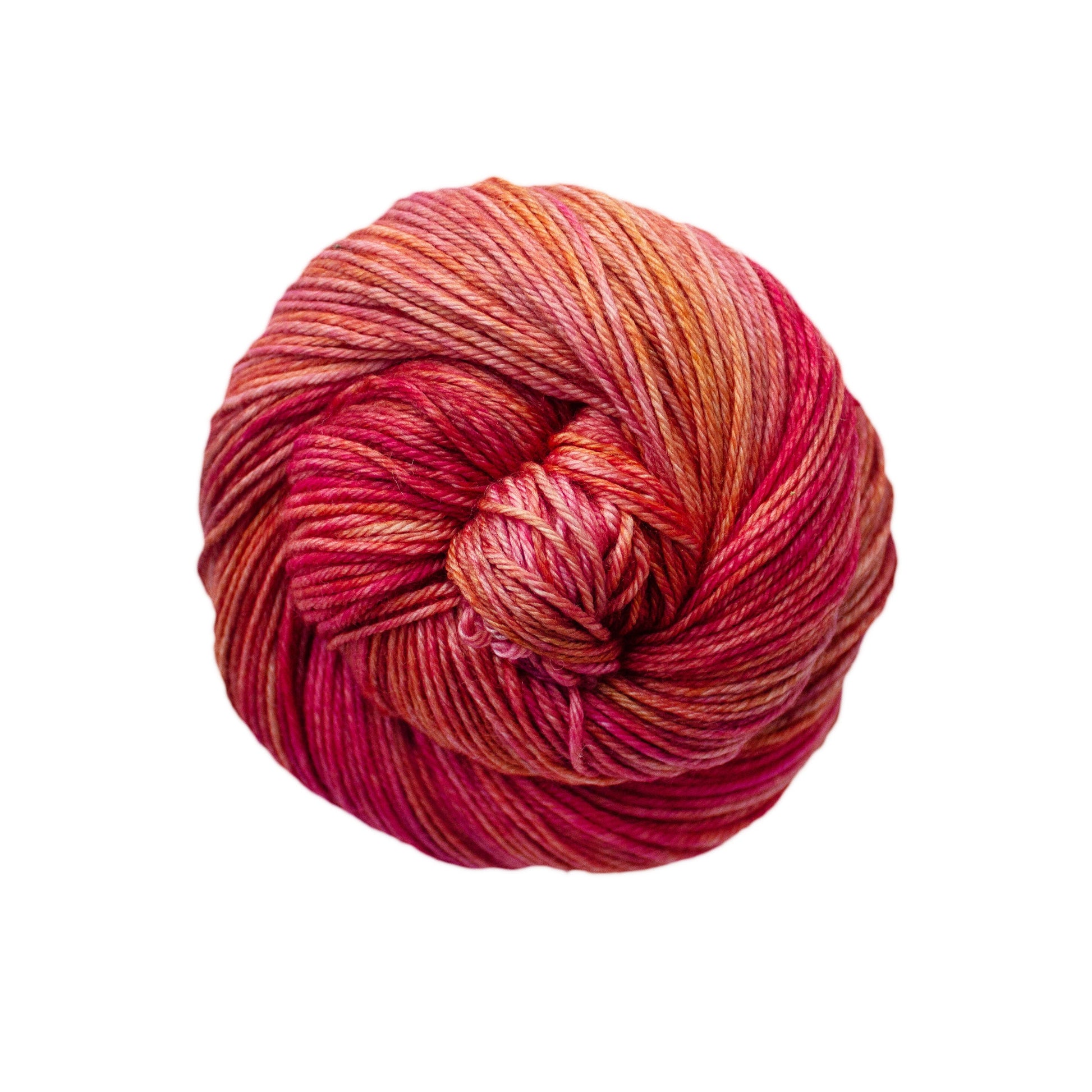 An image of a skein of Malabrigo Arroyo sport weight yarn in bright pink and orange shades.