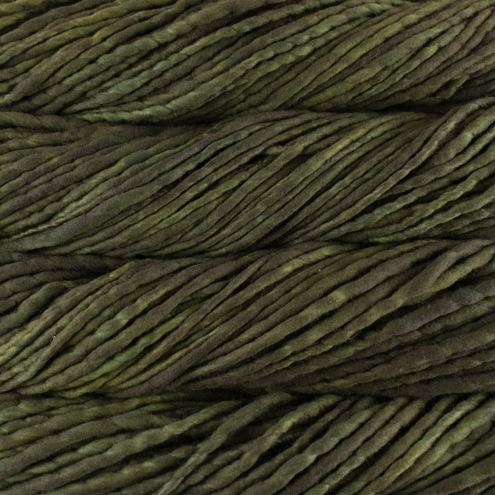 A close-up image of skeins of Malabrigo Rasta yarn in shades of olive green displaying the texture and color variation.