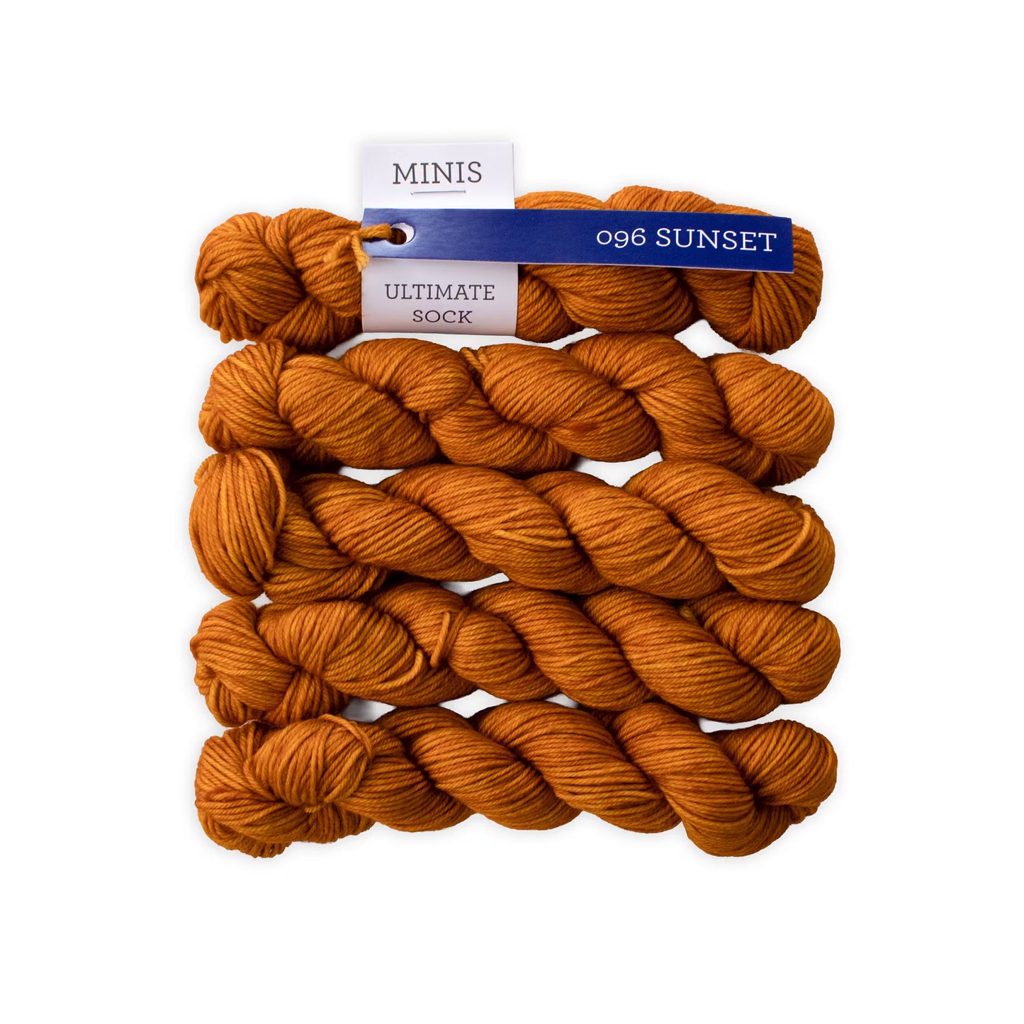 Multiple mini skeins of Malabrigo Ultimate Sock fingering weight yarn in orange color against a white background