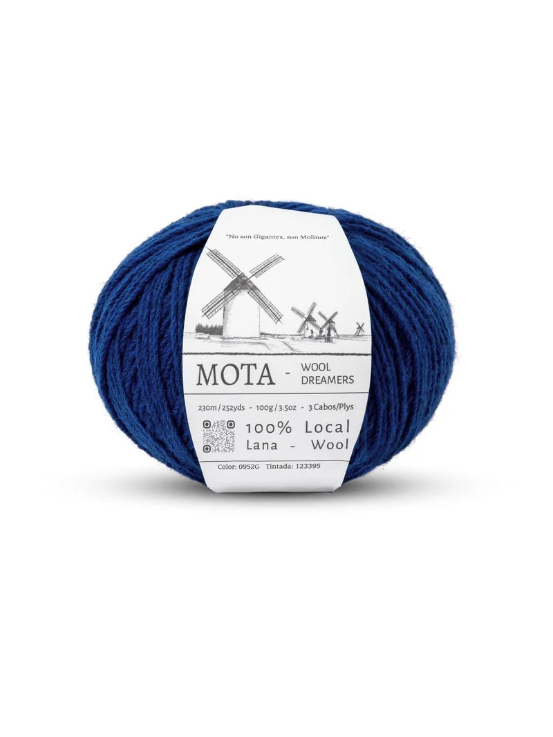 A skein of royal blue yarn on a white background.