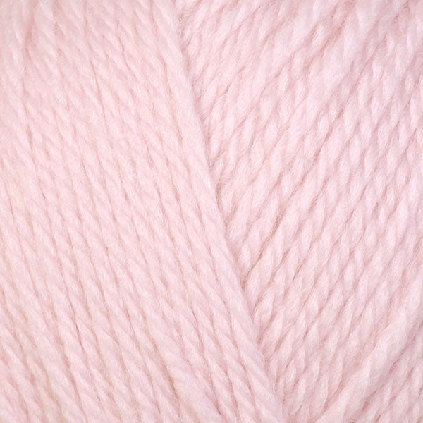 A close-up image of a skein of Berroco Ultra Wool DK weight yarn in a pale pink color.