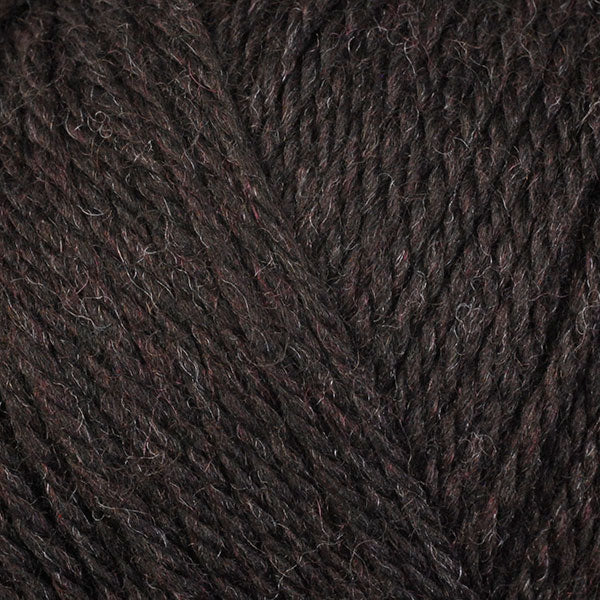 A close-up image of a skein of Berroco Ultra Wool DK weight yarn in a heathered dark brown color.