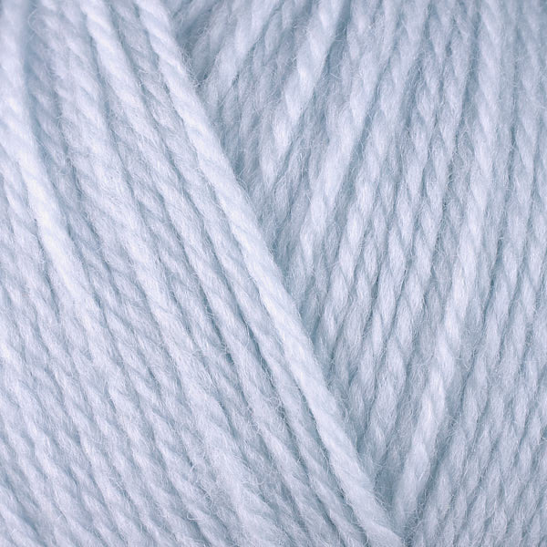 A close-up image of a skein of Berroco Ultra Wool DK weight yarn in a pale blue color.