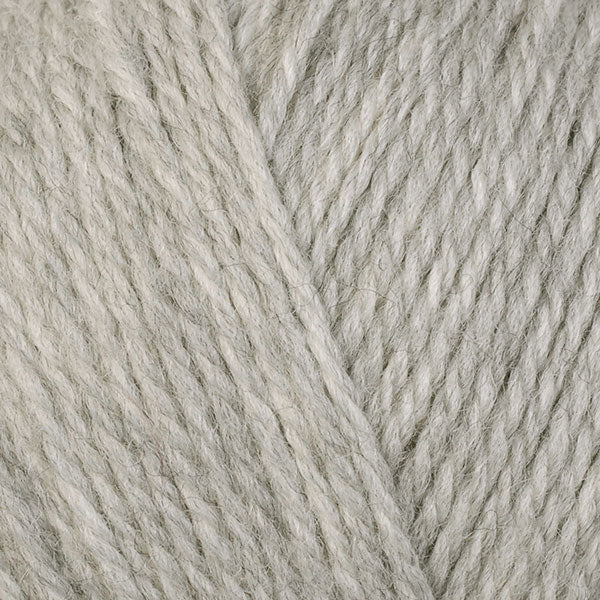 A close-up image of a skein of Berroco Ultra Wool DK weight yarn in a heathered pale gray color.