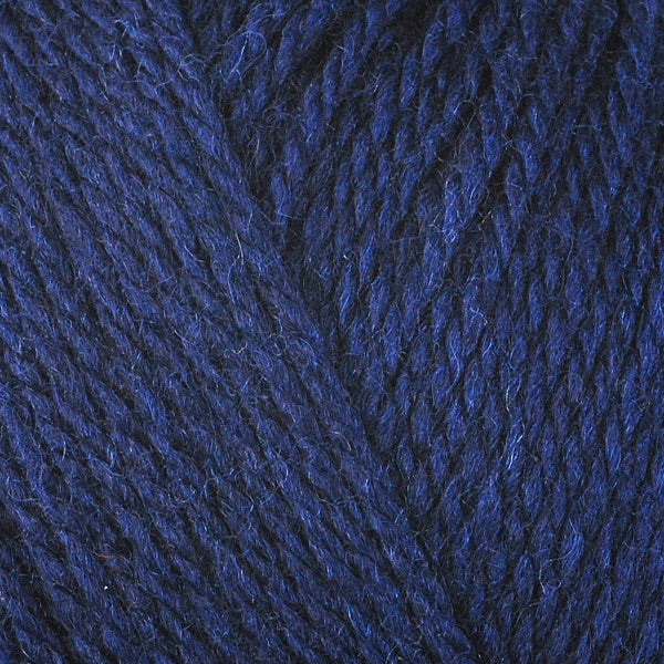 A close-up image of a skein of Berroco Ultra Wool DK weight yarn in an indigo color.
