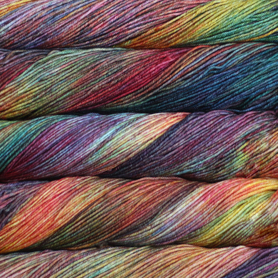 An image of skeins of Malabrigo Arroyo sport weight yarn in a vibrant rainbow of colors.