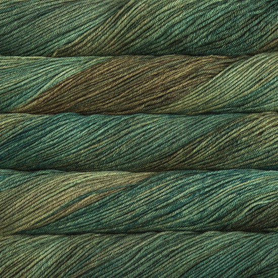 An image of skeins of Malabrigo Arroyo sport weight yarn in aqua green and brown green shades.