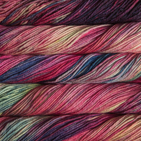 A close up of skeins of Malabrigo Rios worsted weight yarn in a rainbow of colors