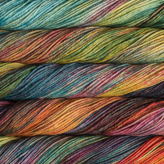 A close up of skeins of Malabrigo Rios worsted weight yarn in rainbow colors