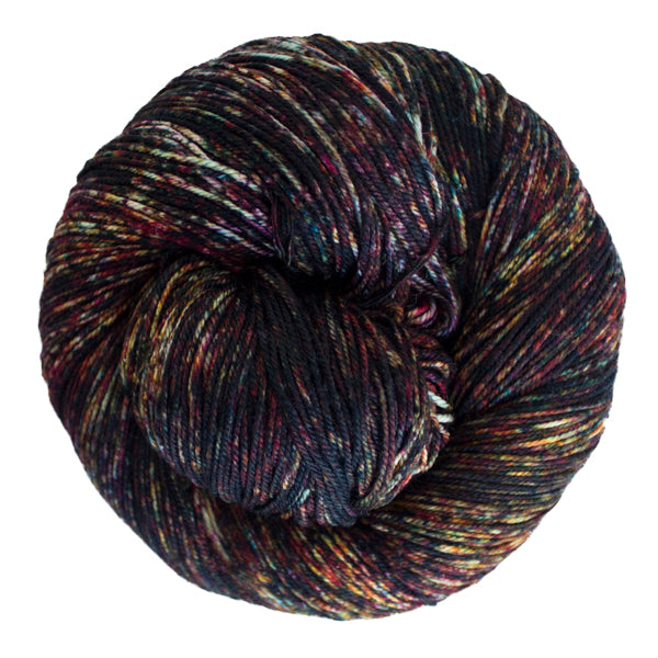 A close-up image of a skein of Malabrigo Sock yarn in dark charcoal, red, and green colors.