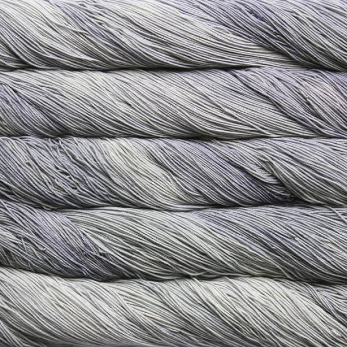 A close-up image of skeins of Malabrigo Sock yarn in pale gray.