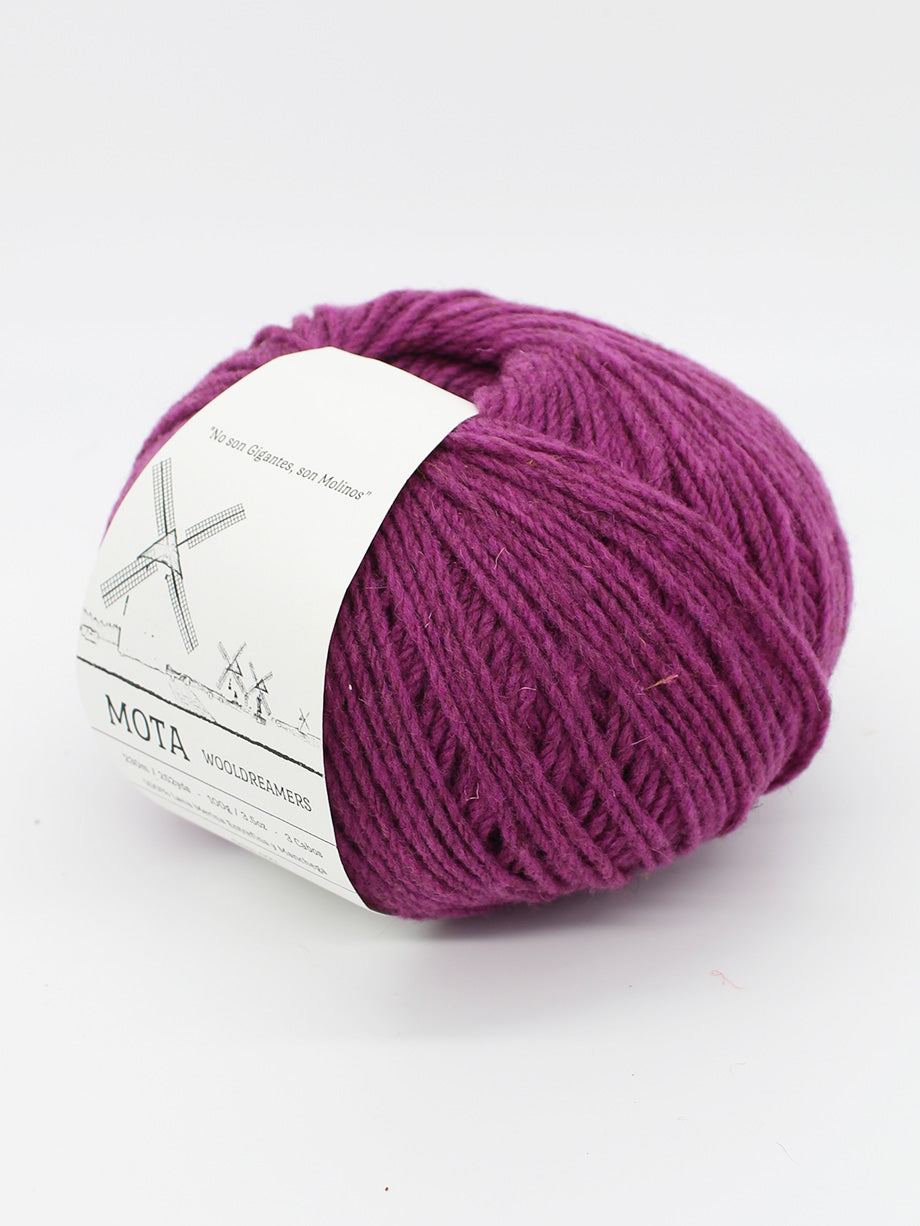 A skein of patriarch purple yarn on a white background.