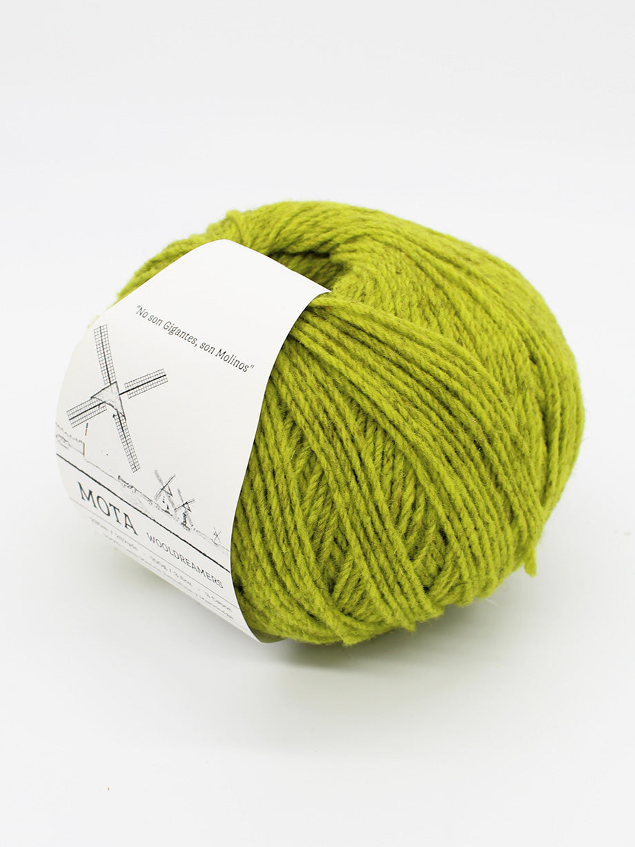 A skein of heathered chartreuse yarn on a white background.