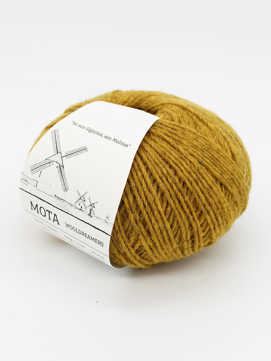 A skein of heathered dandelion yellow yarn on a white background.